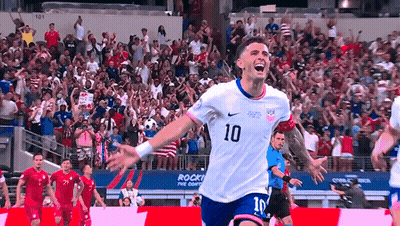 A Soccer Player With The Number 10 On His Jersey Is Celebrating GIF