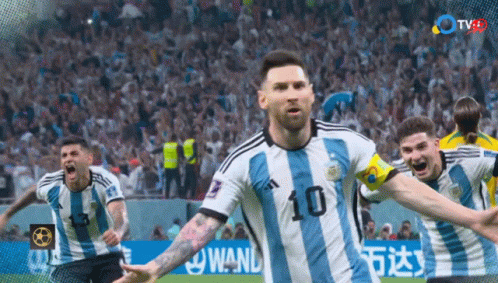 A Soccer Player With The Number 10 On His Jersey Is Celebrating GIF