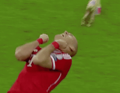 A Soccer Player With The Number 10 On His Jersey Is Kneeling Down On The Field GIF