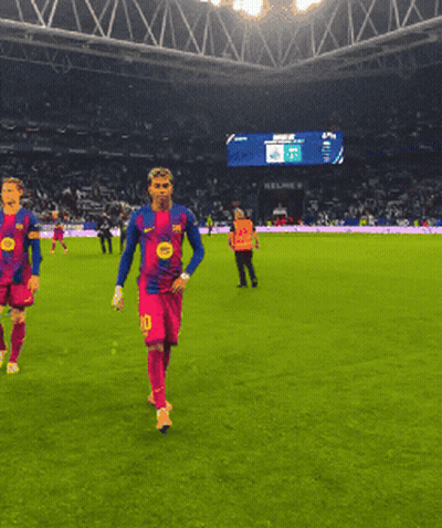 A Soccer Player With The Number 10 On His Jersey Is Running On The Field GIF