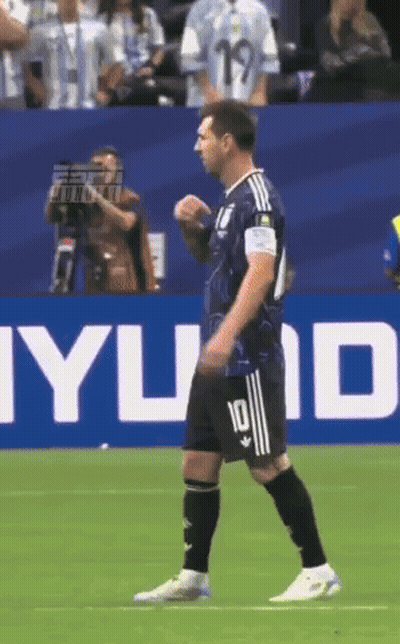 A Soccer Player With The Number 10 On His Jersey Is Walking On The Field GIF