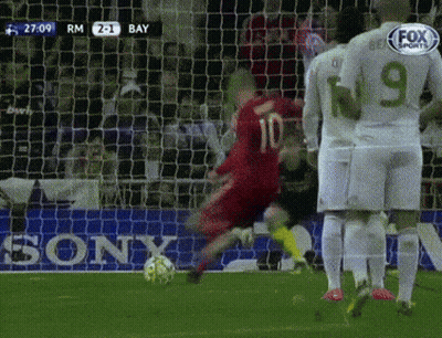 A Soccer Player With The Number 10 On His Jersey Kicks The Ball GIF