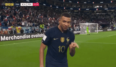 A Soccer Player With The Number 10 On His Jersey Stands On The Field GIF