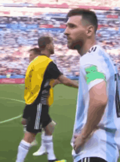 A Soccer Player With The Number 10 On His Jersey Stands On The Field GIF