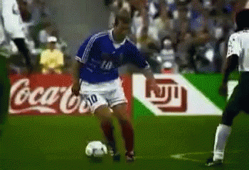 A Soccer Player With The Number 10 On His Shorts Is Running With The Ball GIF