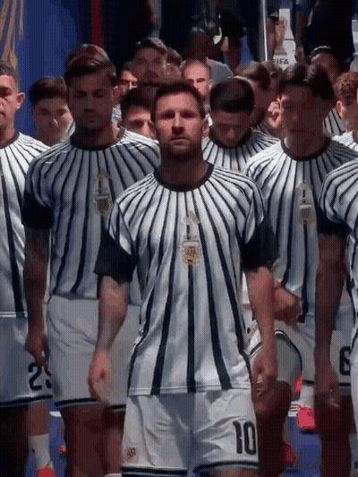 A Soccer Player With The Number 10 On His Shorts Walks With His Team GIF