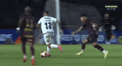 A Soccer Player With The Number 11 On His Jersey Kicks The Ball GIF