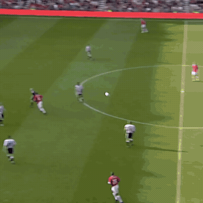 A Soccer Player With The Number 11 On His Jersey Stands On The Field GIF