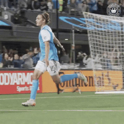 A Soccer Player With The Number 15 On His Shorts Is Running On The Field GIF