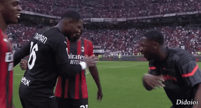 A Soccer Player With The Number 16 On His Back Is Hugging Another Player GIF
