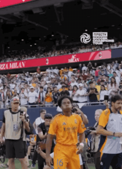 A Soccer Player With The Number 16 On His Jersey Walks Off The Field GIF
