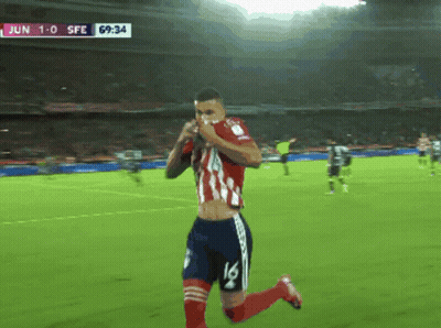 A Soccer Player With The Number 16 On His Shorts Is Running On The Field GIF