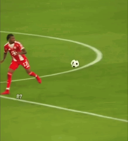 A Soccer Player With The Number 17 On His Jersey Is Kicking The Ball GIF