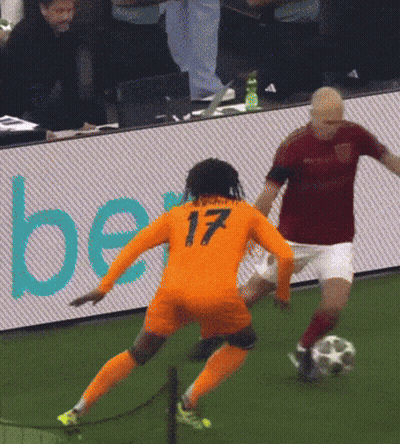 A Soccer Player With The Number 17 On His Jersey Kicks The Ball GIF