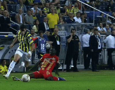 A Soccer Player With The Number 18 On His Jersey Is Kicking The Ball GIF