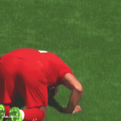 A Soccer Player With The Number 18 On His Shirt Is Talking To Another Player GIF