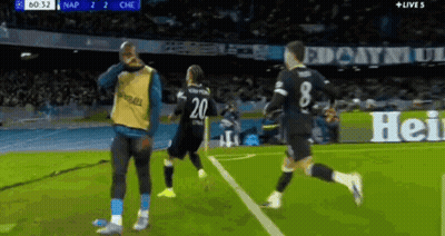 A Soccer Player With The Number 20 On His Back Is Running On The Field GIF