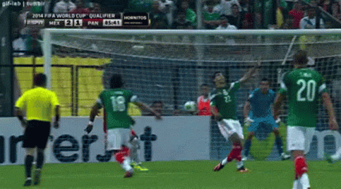 A Soccer Player With The Number 20 On His Back Kicks A Ball GIF