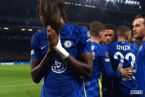 A Soccer Player With The Number 22 On His Jersey Is Praying GIF
