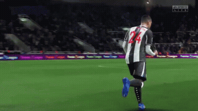A Soccer Player With The Number 24 On His Back Is Running On A Field GIF