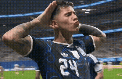 A Soccer Player With The Number 24 On His Jersey Is Blowing A Kiss GIF