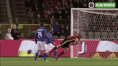 A Soccer Player With The Number 24 On His Jersey Jumps Towards The Goal GIF