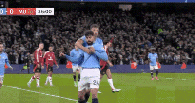 A Soccer Player With The Number 24 On His Shorts Is Hugging Another Player On The Field GIF