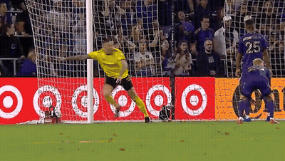 A Soccer Player With The Number 25 On His Jersey Is Jumping In The Air GIF