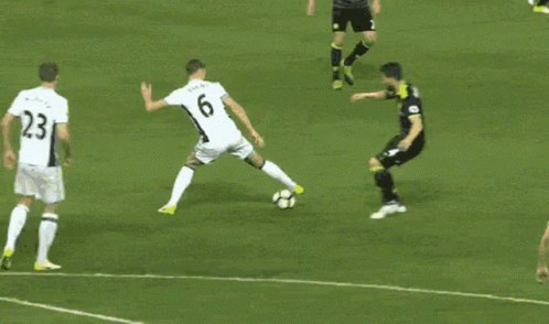 A Soccer Player With The Number 25 On His Jersey Is Trying To Get The Ball GIF
