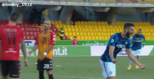 A Soccer Player With The Number 29 On His Shorts Is Standing On A Field GIF