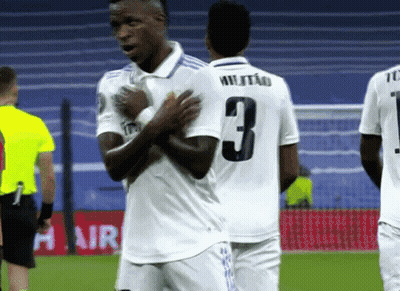 A Soccer Player With The Number 3 On His Jersey Is Talking To Another Player GIF