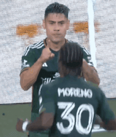 A Soccer Player With The Number 30 On His Back Is Giving A Thumbs Up GIF