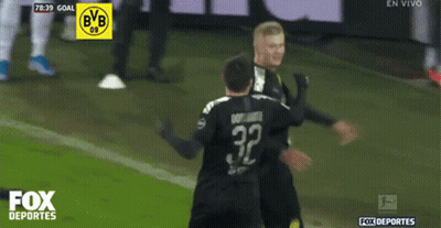 A Soccer Player With The Number 32 On His Jersey Celebrates A Goal GIF