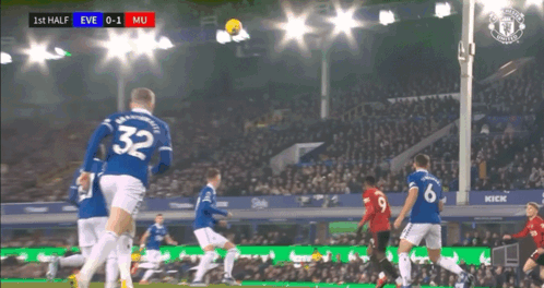 A Soccer Player With The Number 32 On His Jersey Kicks The Ball GIF