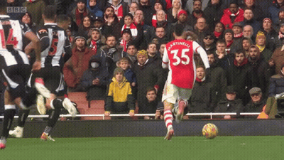 A Soccer Player With The Number 35 On His Back Kicks The Ball GIF