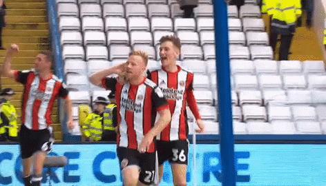 A Soccer Player With The Number 36 On His Shorts Celebrates GIF
