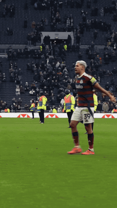 A Soccer Player With The Number 39 On His Shorts Is Standing On The Field GIF