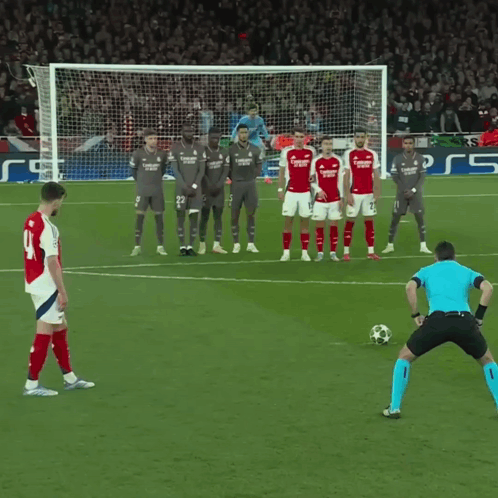 A Soccer Player With The Number 41 On His Jersey Kicks The Ball GIF
