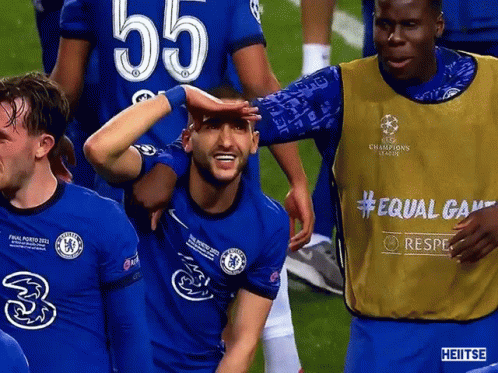 A Soccer Player With The Number 55 On His Jersey Is Surrounded By Other Players GIF