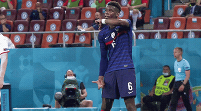 A Soccer Player With The Number 6 On His Jersey Is Standing On The Field During A Soccer Game . GIF
