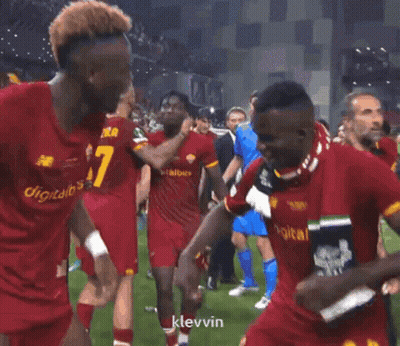 A Soccer Player With The Number 6 On His Shorts Is Dancing With His Teammates GIF
