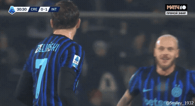 A Soccer Player With The Number 7 On His Back Is Hugging His Teammates GIF