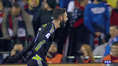 A Soccer Player With The Number 7 On His Jersey Is Celebrating GIF