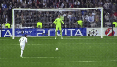 A Soccer Player With The Number 7 On His Jersey Is Kicking The Ball GIF