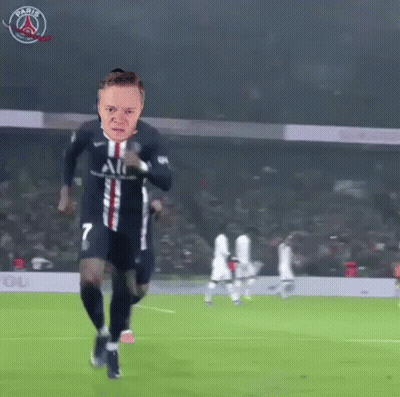 A Soccer Player With The Number 7 On His Jersey Is Running On A Field . GIF