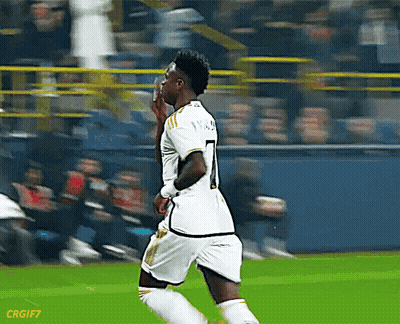 A Soccer Player With The Number 7 On His Jersey Is Running On The Field GIF