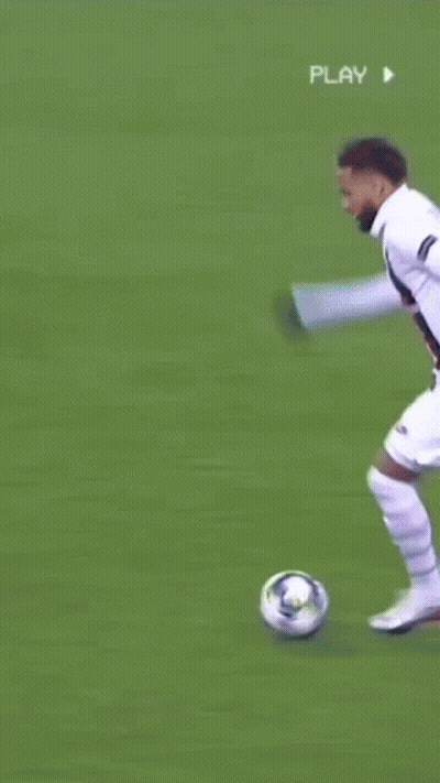 A Soccer Player With The Number 7 On His Shirt Is Running Towards Another Player On The Field . GIF