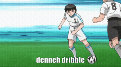 A Soccer Player With The Number 8 On His Jersey Is Kicking The Ball GIF