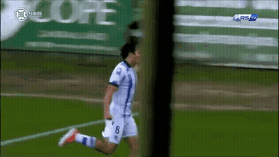 A Soccer Player With The Number 8 On His Jersey Is Running On A Field GIF