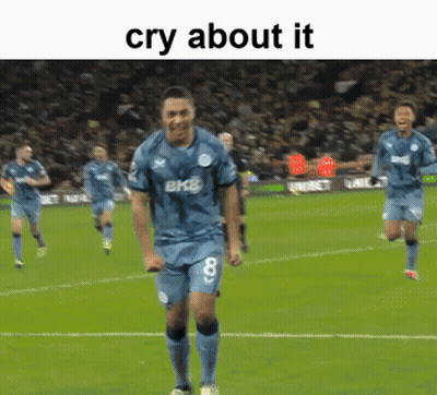 A Soccer Player With The Number 8 On His Jersey Is Running On The Field GIF
